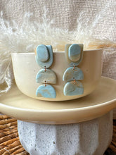 Load image into Gallery viewer, ππ§π π¨π π π€π’π§π- Where the skies are blue